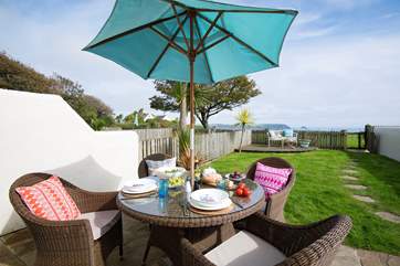 The lovely enclosed garden with views of Nare headland & Gull Rock.