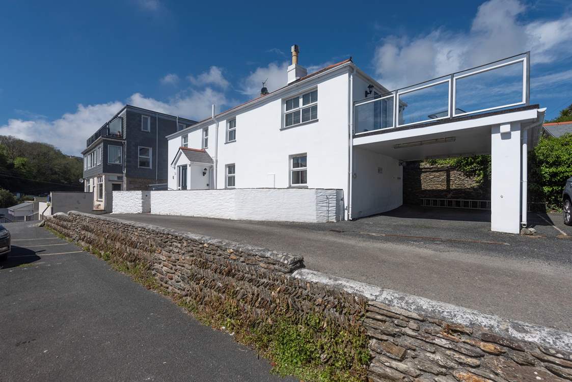 The exterior of the house (parking is just past the front of the house under the raised terrace).
