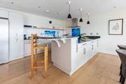 Perch at the breakfast bar and enjoy an aperitif.