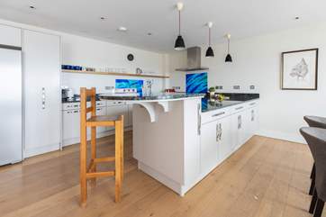 Perch at the breakfast bar and enjoy an aperitif.