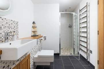 Wash salty toes in the rainfall shower in the family bathroom on the ground floor.