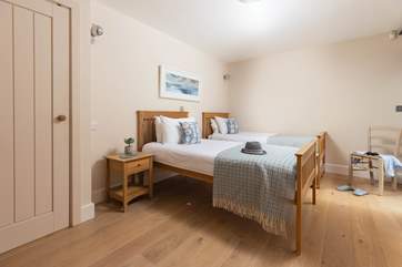 The pretty twin bedroom is ideal for either children or adults.