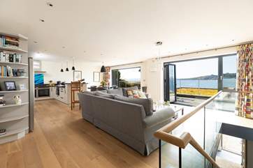 Climb the open tread staircase to the stunning first floor and immerse yourself the the panoramic views.