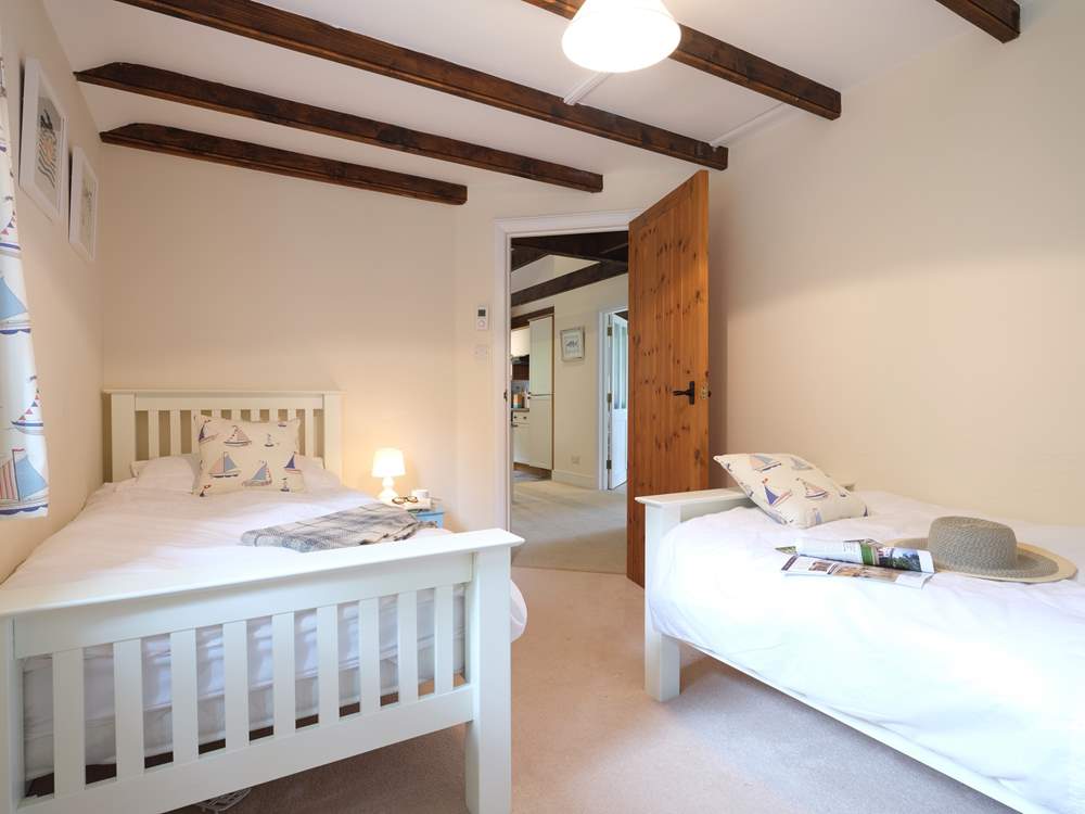 Bedroom 2 has twin beds, perfect for either children or adults.