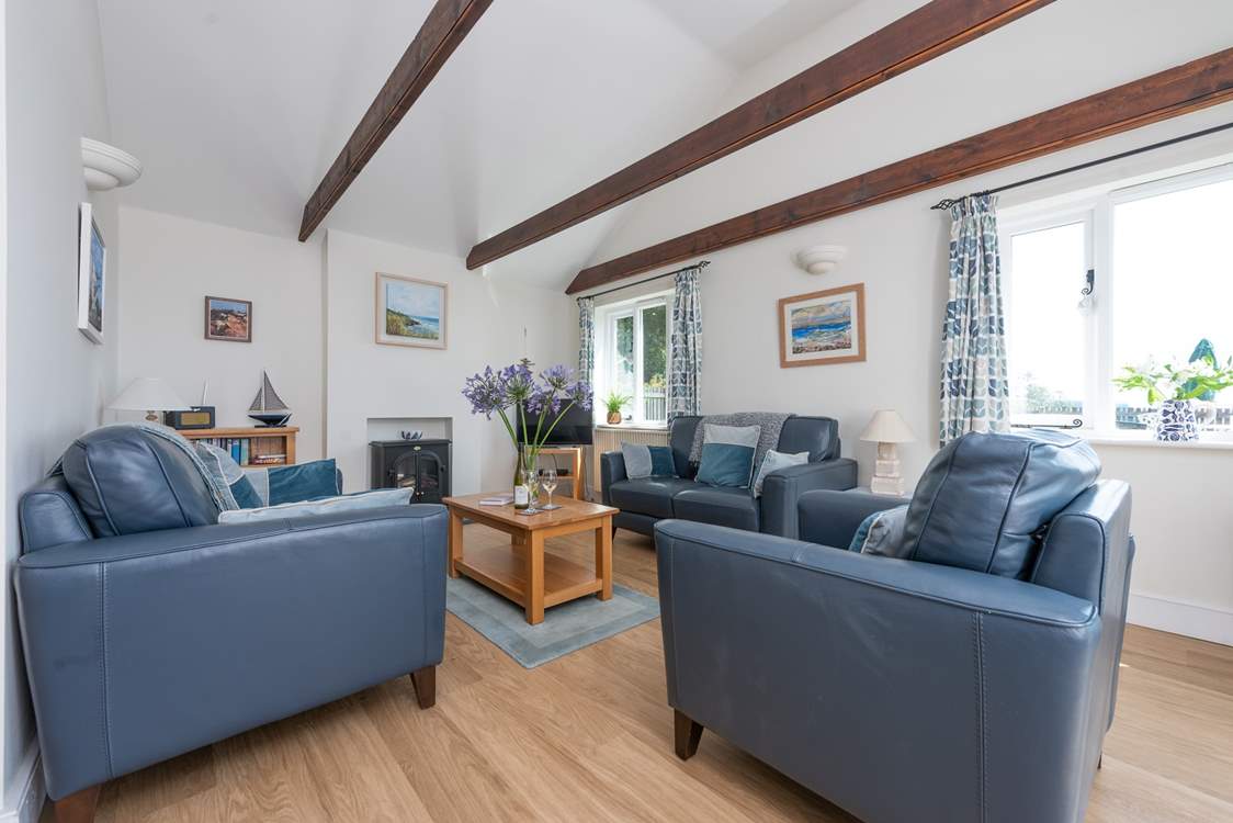 Relax in front of the wood-burner effect electric stove.