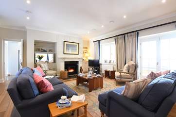 The sitting-room with its cosy wood-burner.