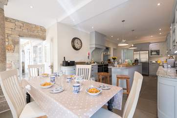 Smaller groups can enjoy breakfast in the kitchen.