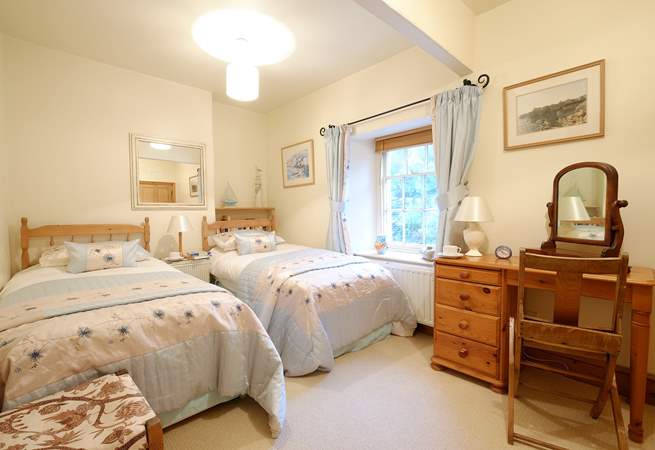 Bedroom 2 has twin beds, ideal for either children or adults.