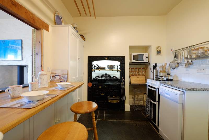 The kitchen with fabulous ornamental Cornish range.