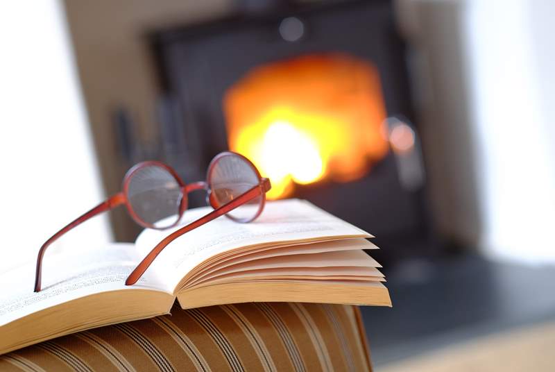 Snuggle up in front of the wood-burner with a good book.