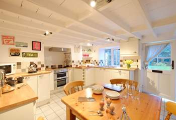 The characterful kitchen/dining-room, perfect for sociable dining.