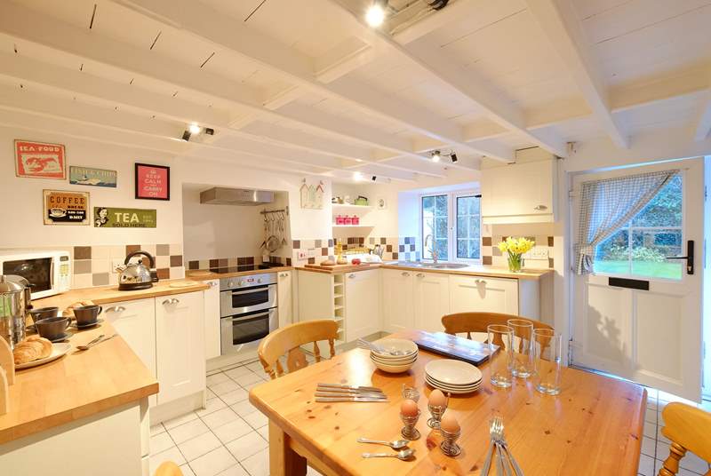The characterful kitchen/dining-room, perfect for sociable dining.