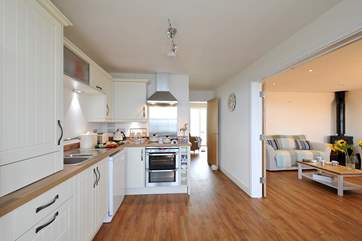 The light and bright kitchen and living-area.