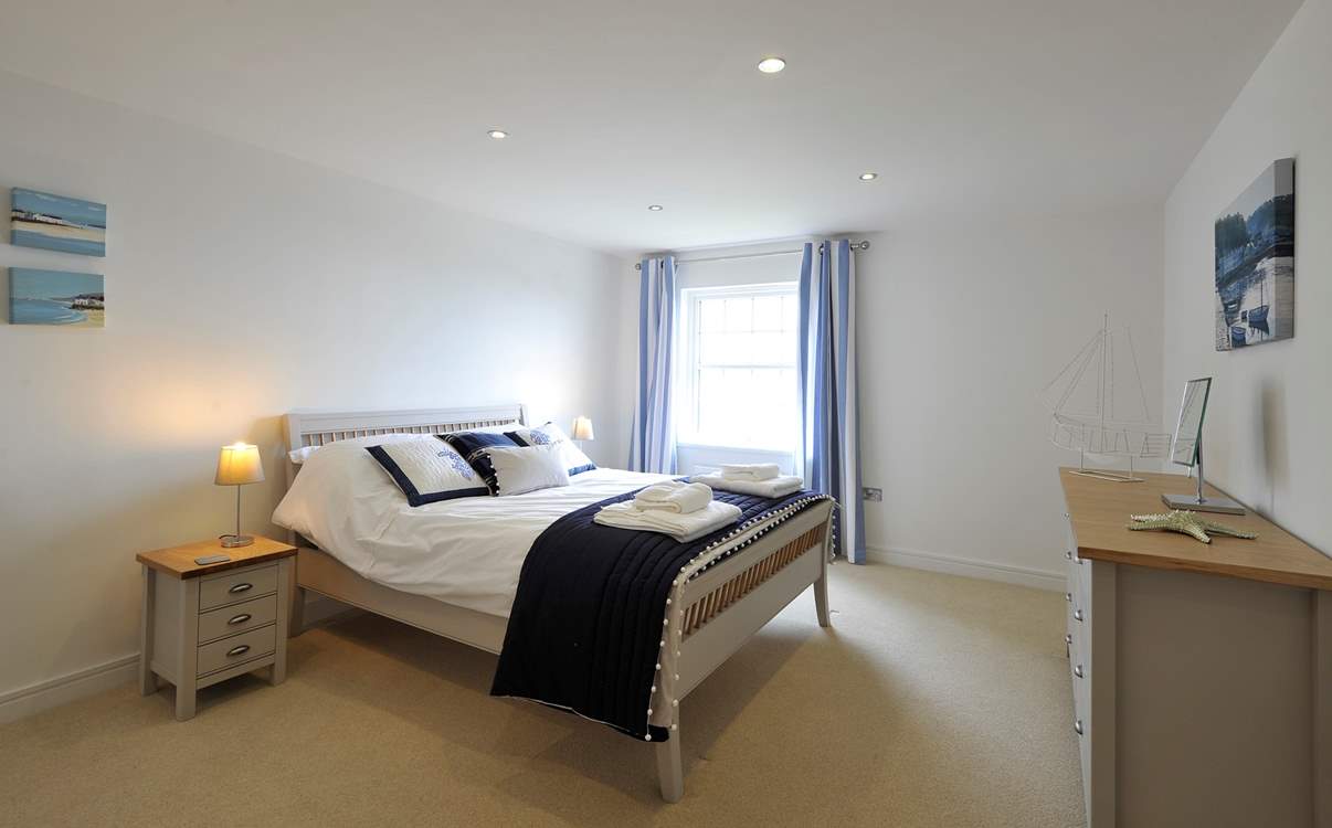 Bedroom 1 has a comfy king-size bed and en suite shower-room.