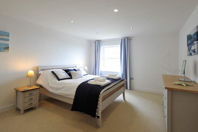 Bedroom 1 has a comfy king-size bed and en suite shower room.