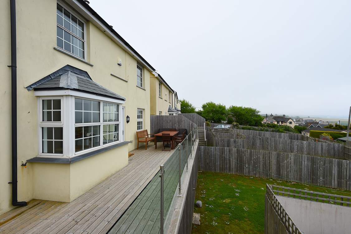 Harbour View has a lovely decked area and lawn.