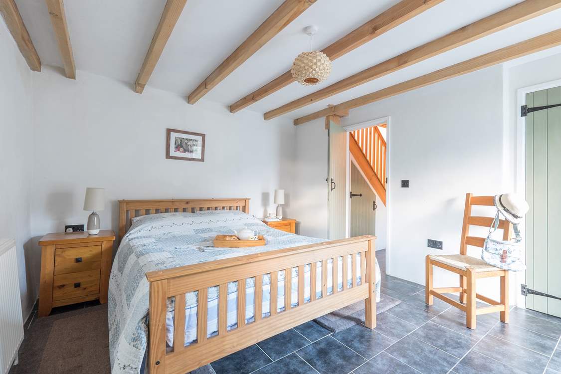 The large double bedroom has a comfy king-size bed.