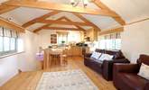 The cosy open plan living-room. - Thumbnail Image