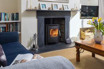 The comfy sofa invites you to kick back and relax.