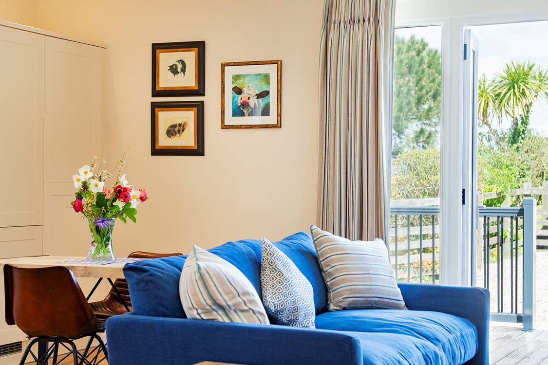 Sit back and relax on the comfy sofa.