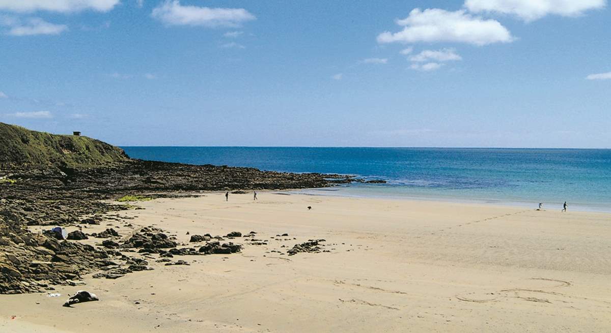 Porthcurnick beach at low tide.