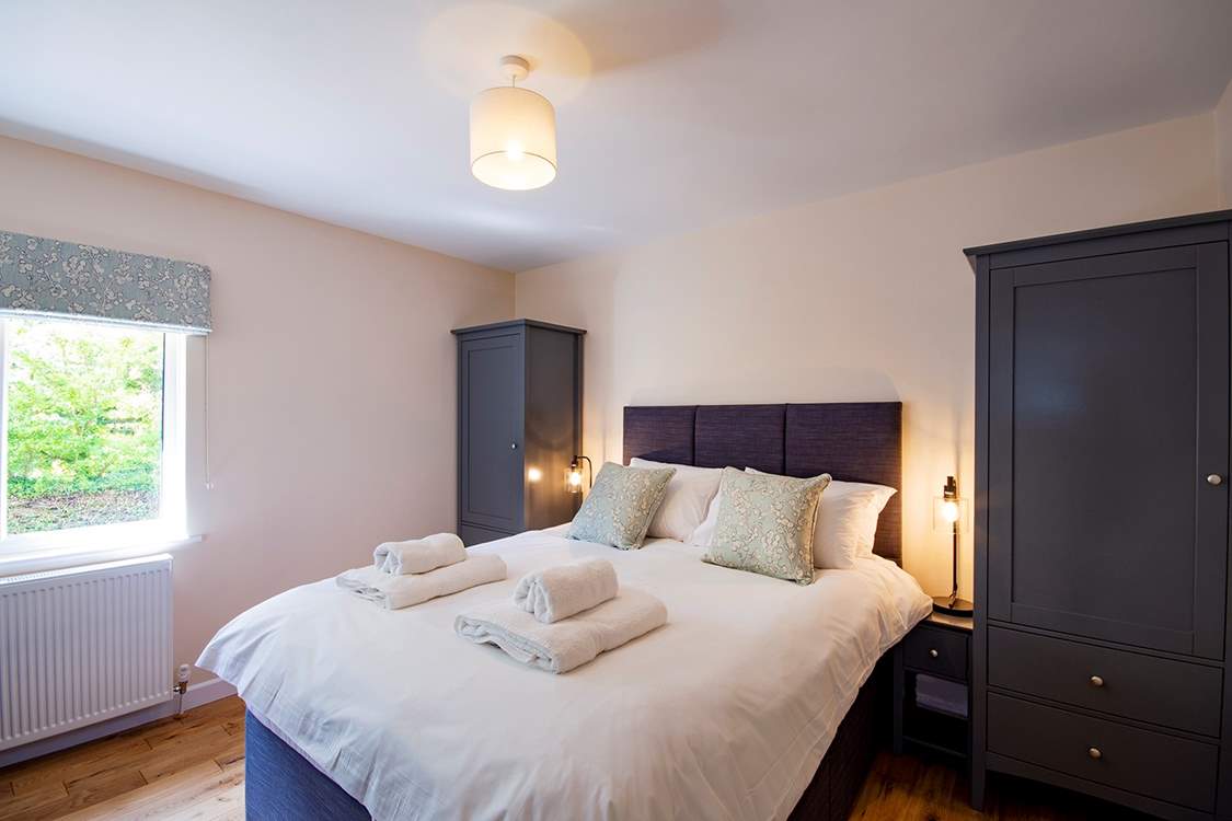Bedroom 3 has a king-size bed.