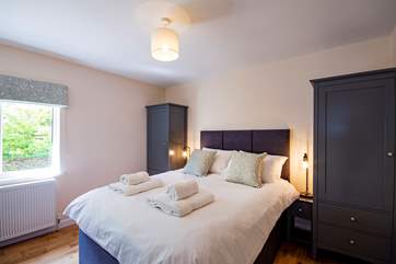 Bedroom 3 has a king-size bed.
