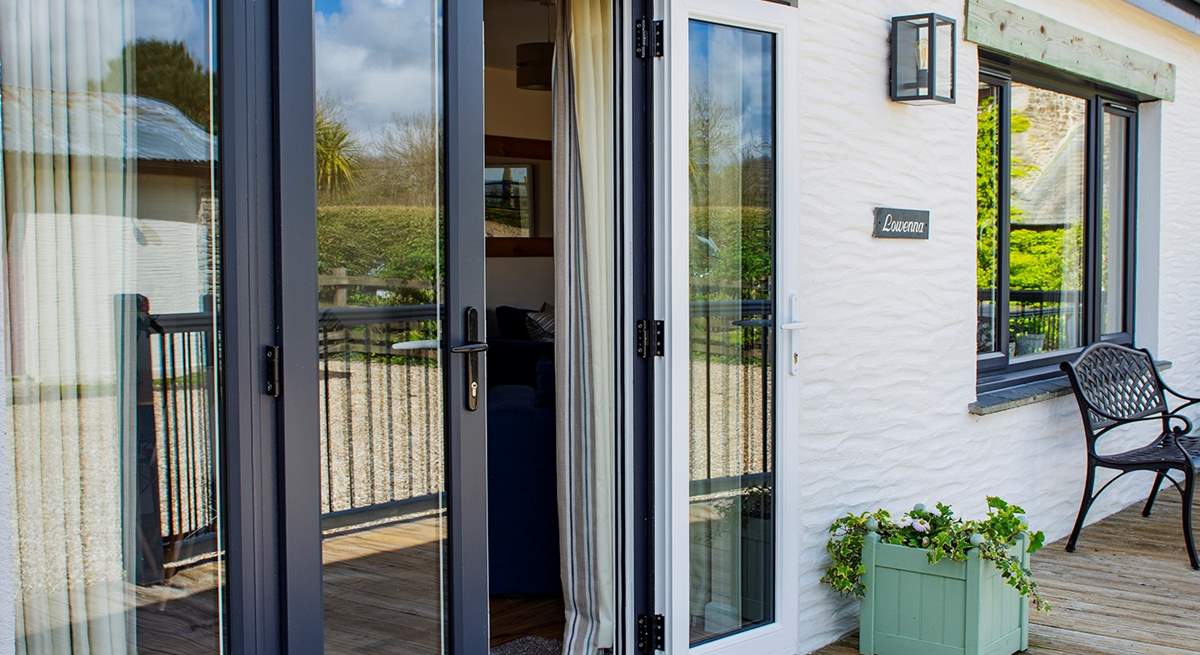 French doors lead out on to the decked area.