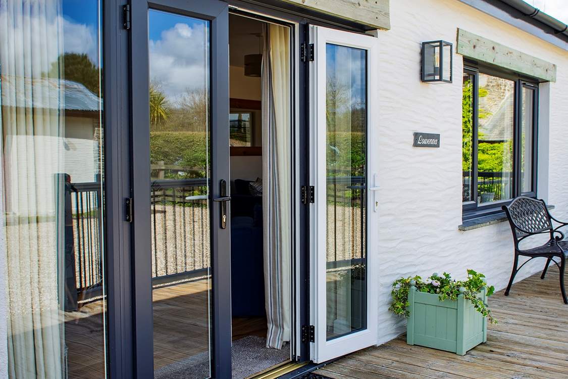 French doors lead out on to the decked area.