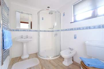 The family shower-room is light and bright.