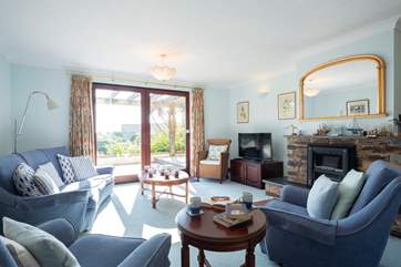 The sitting-room has plenty of space for all the family.