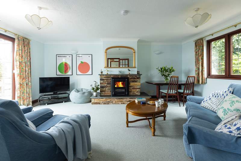 The cosy sitting-room is the perfect place to relax after a busy day.