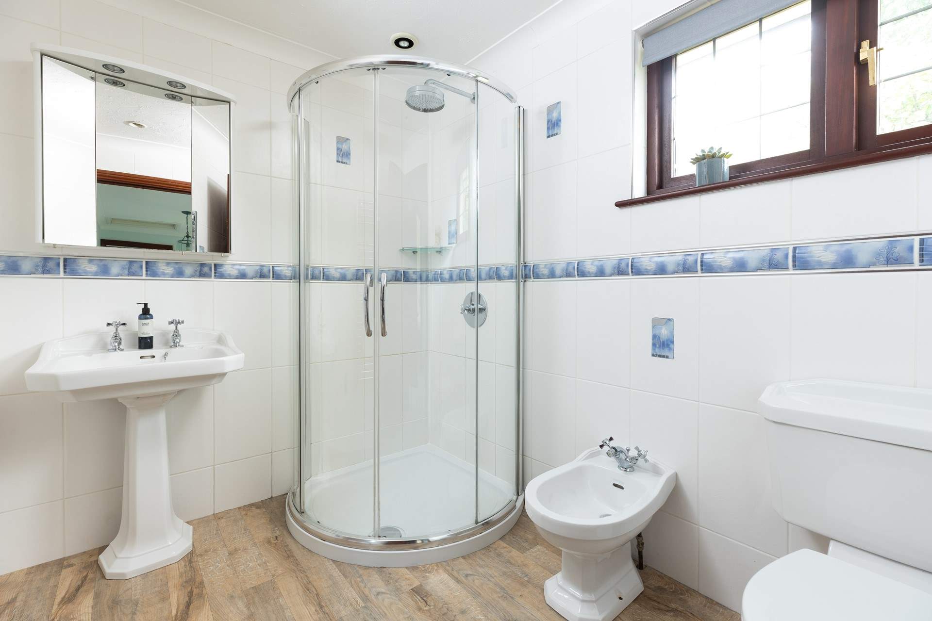 The family shower-room is light and bright.