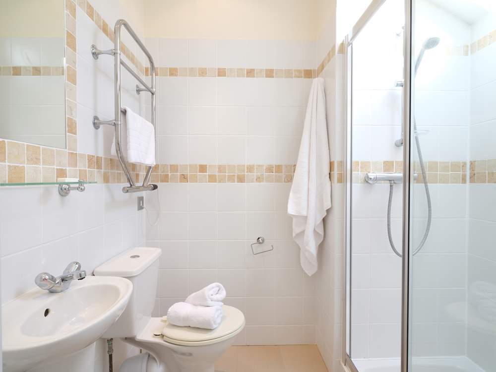 The en suite shower-room to bedroom 5.