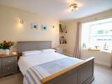 Bedroom 1 is at the front of the house and has a king-size double bed (5').