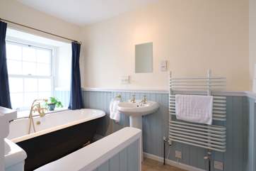 The en suite bathroom to bedroom 1 has a fabulous roll-top bath.