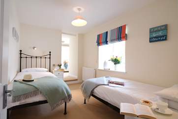 Pretty bedroom 4 has twin beds.