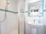 The en suite shower-room to bedroom 4.