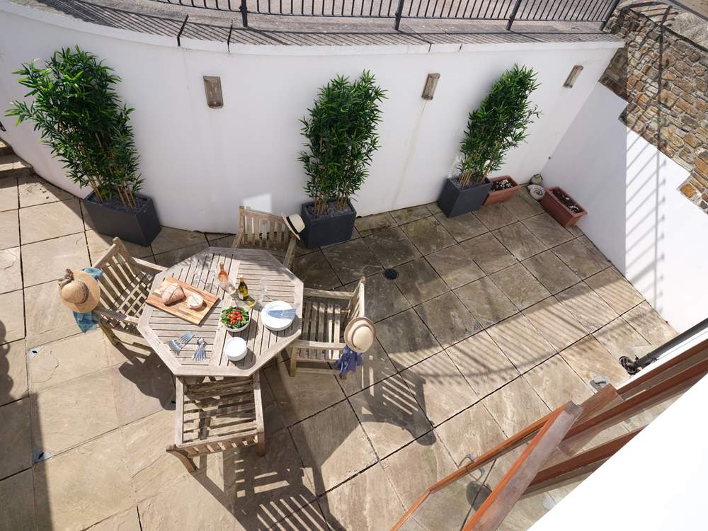 The rear terrace gets the late afternoon sun.