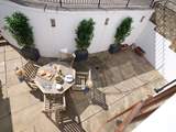 The rear terrace gets the late afternoon sun.