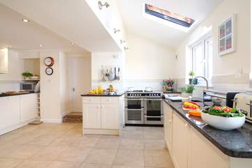 The kitchen is spacious and light.