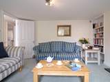Enjoy some quiet time while the children play in the sitting-room opposite.