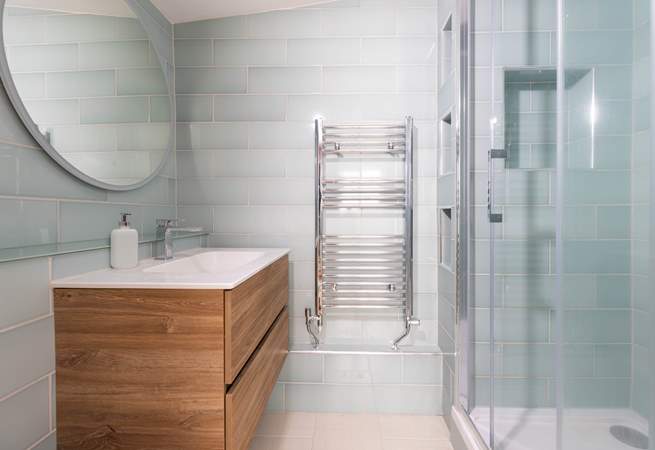 The modern en suite shower-room to bedroom 2. 