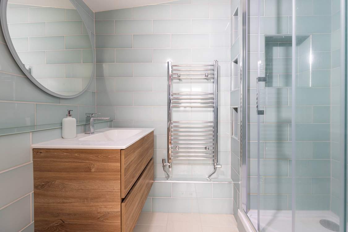 The modern en suite shower-room to bedroom 2.