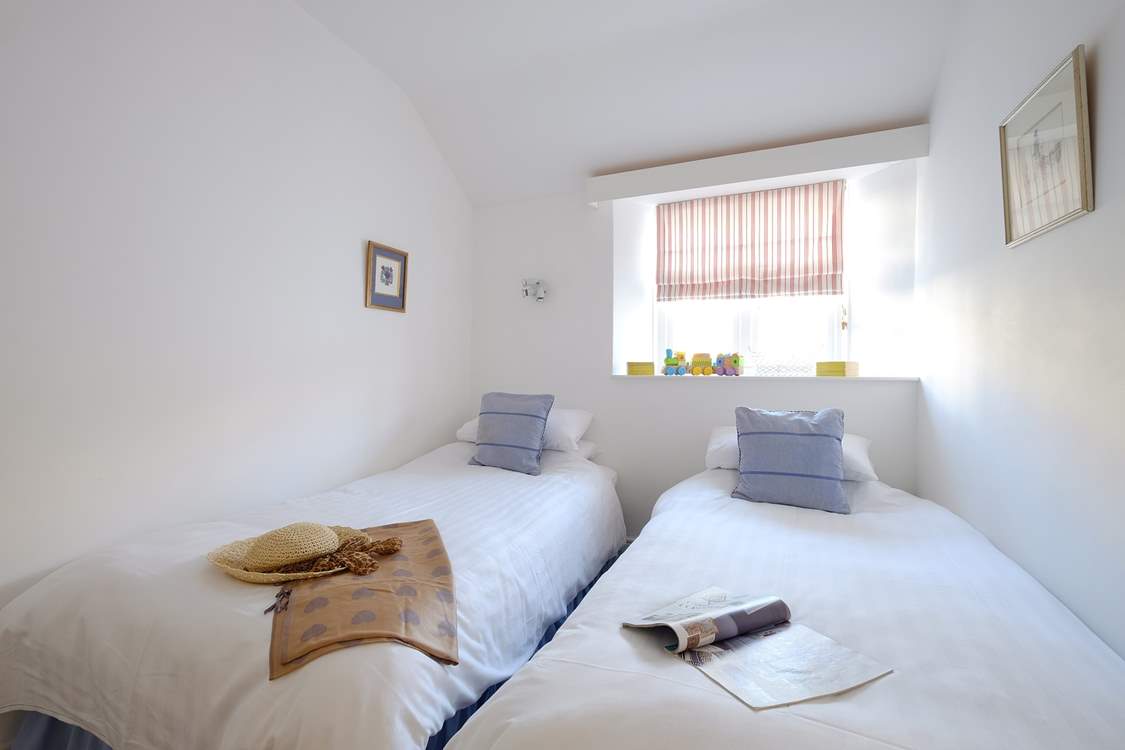 Bedroom 3 is another twin-room, perfect for the younger members of the party.