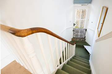 Looking downstairs from the bedrooms to the half landing.