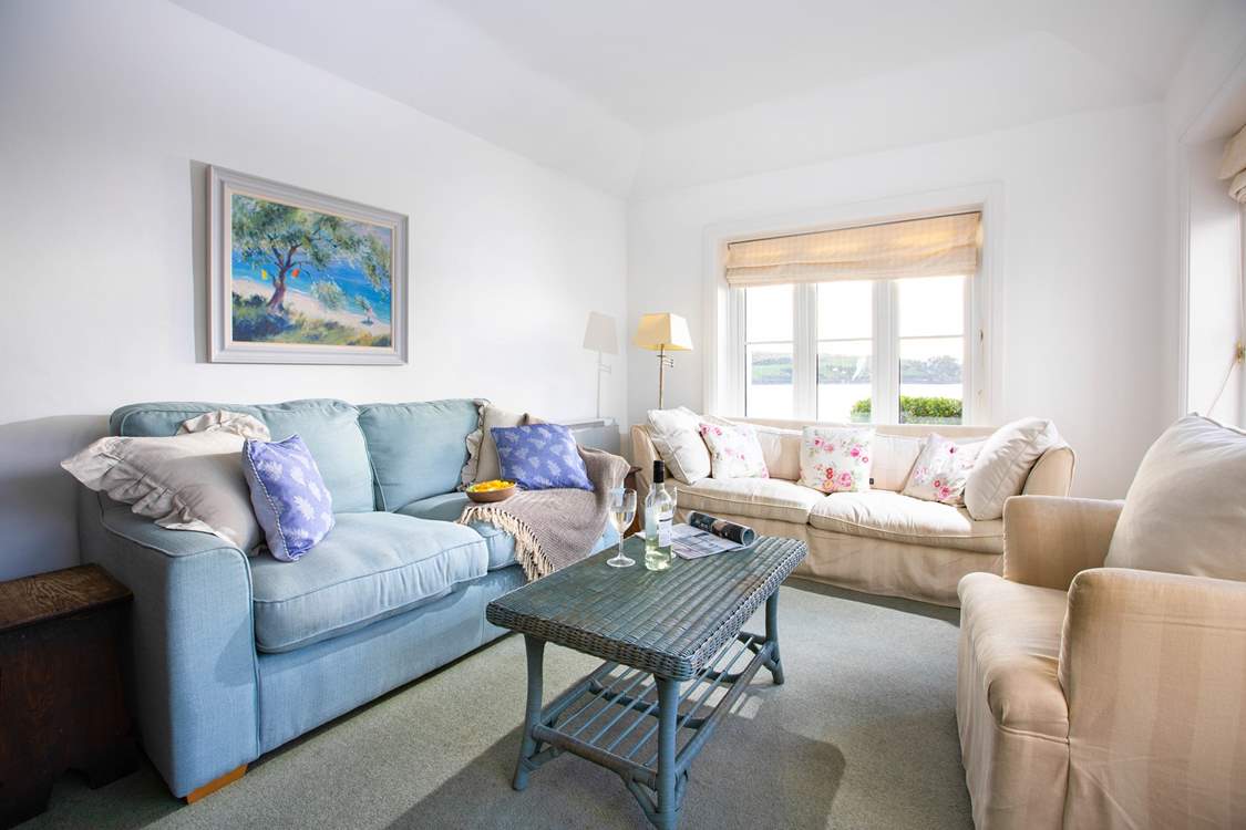Tine to get cosy in the living room with a view over St Mawes harbour and beyond.