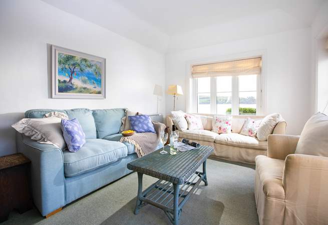 Tine to get cosy in the living room with a view over St Mawes harbour and beyond.