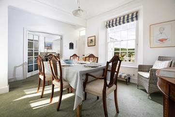 Gather around the dining table to enjoy a delicious meal.