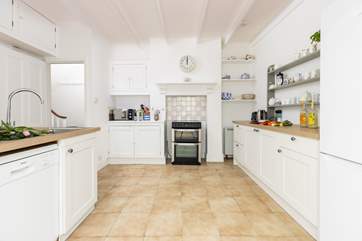 The light and bright kitchen is a delight.